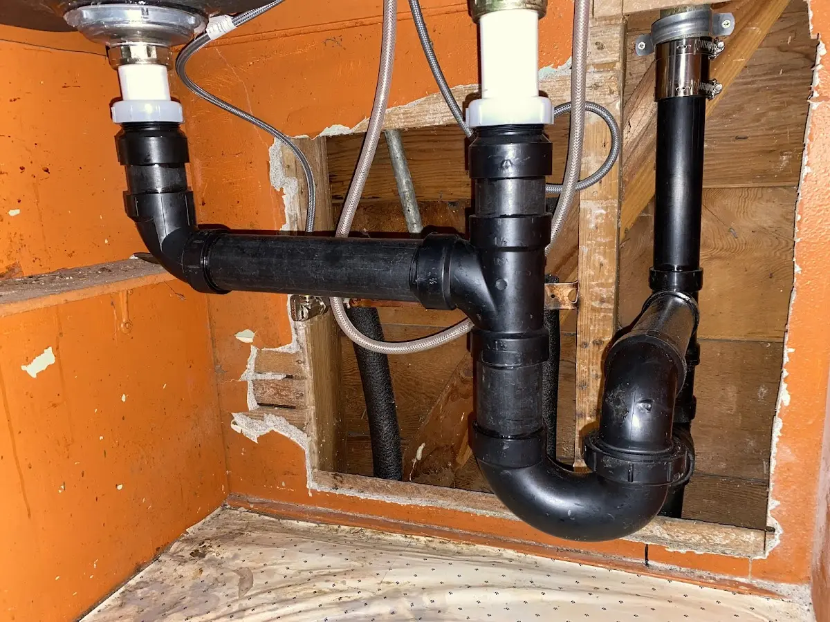 Professional Garbage Disposal Repair equipment and tools on the job in Riverview